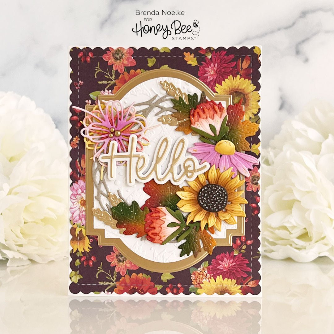 Autumn-themed handmade card with floral embellishments and a gold 'Hello' sentiment.