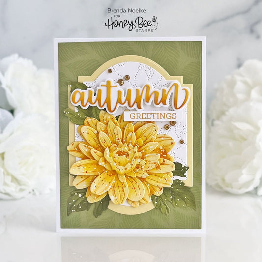 Handmade autumn greetings card with a large yellow 3D flower and script lettering.