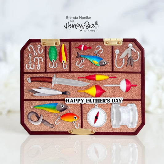 Handmade Father's Day card featuring a detailed fishing tackle box with lures and accessories.