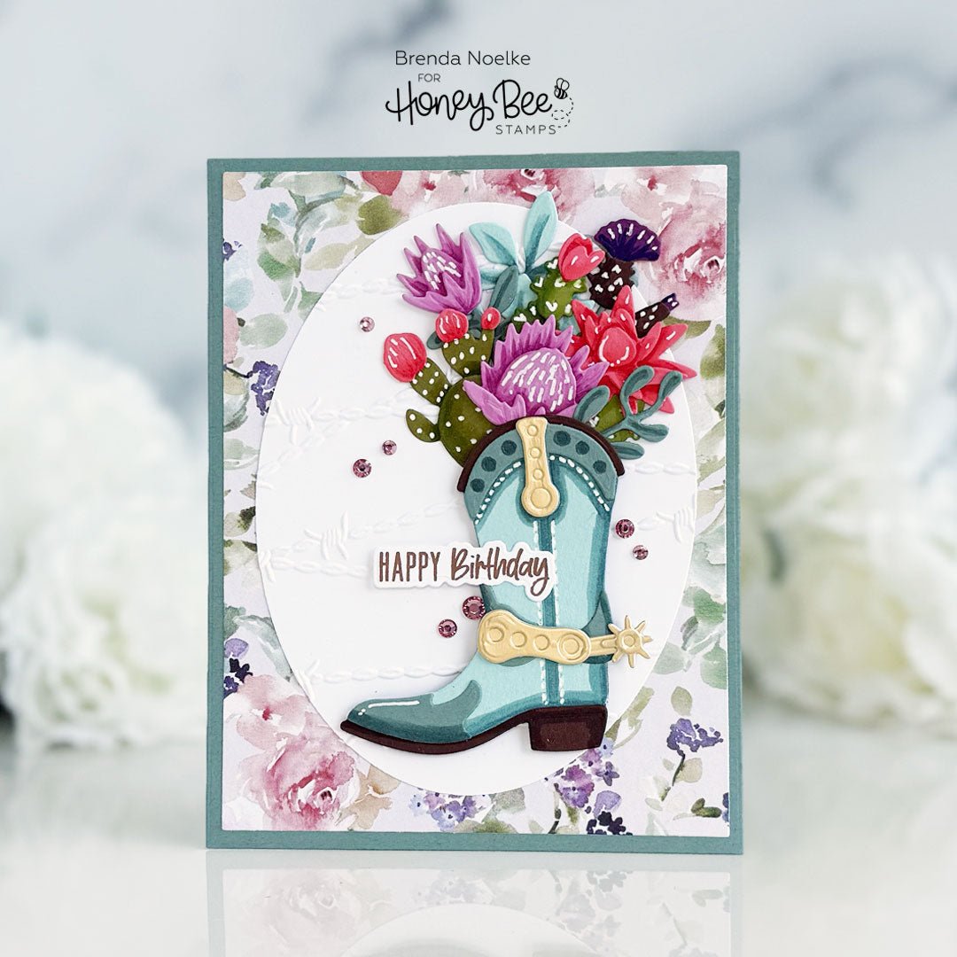 Handmade birthday card featuring a teal cowboy boot filled with colorful paper flowers.