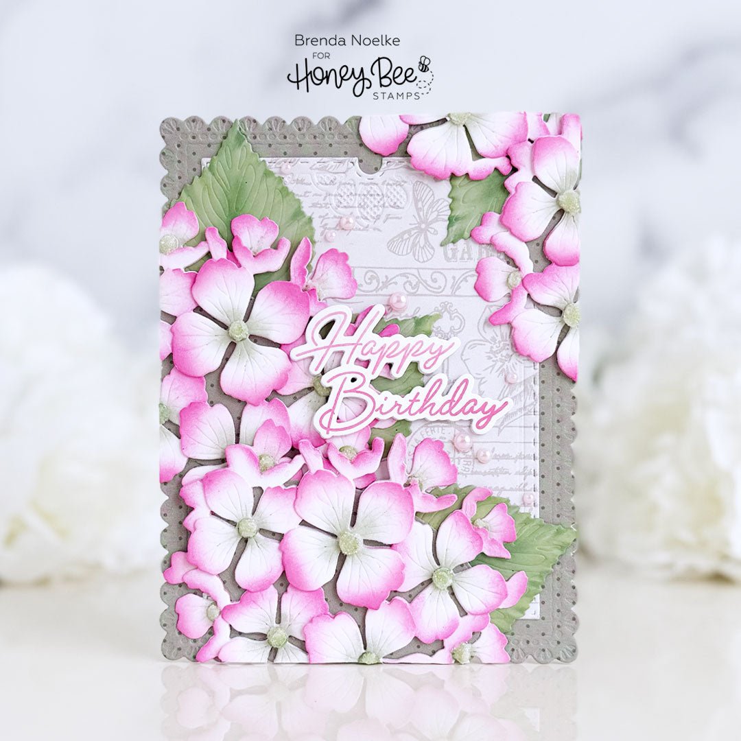 Handmade birthday card featuring 3D pink hydrangea flowers and 'Happy Birthday' sentiment.