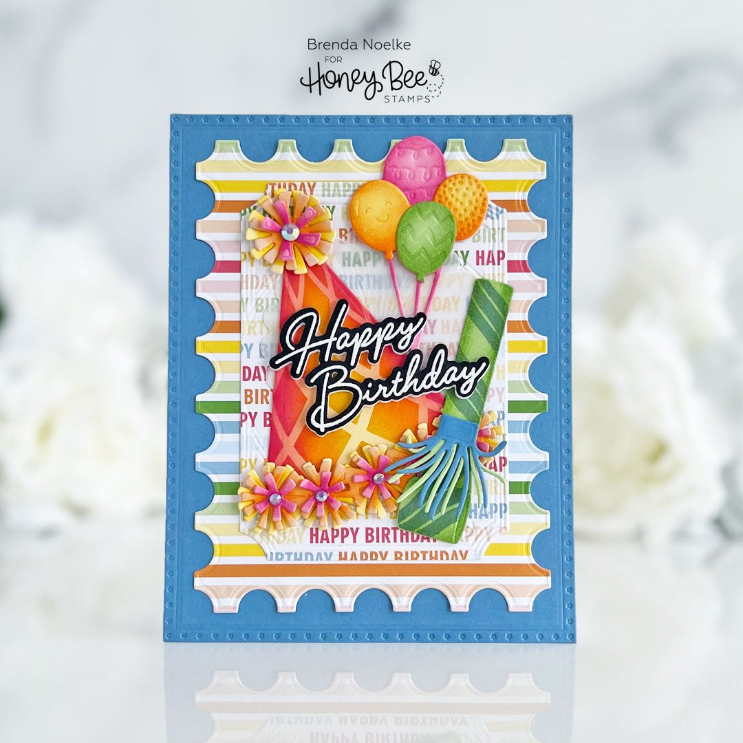 Handmade birthday card featuring a party hat, balloons, and a party blower.