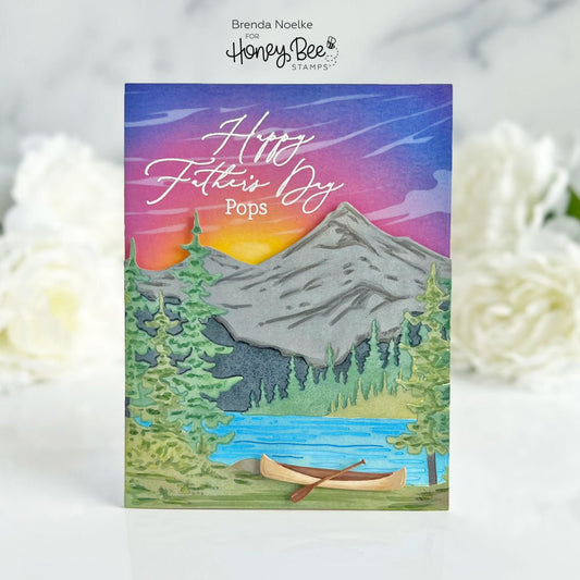 Handmade Father's Day card featuring a scenic 3D mountain, lake, and canoe landscape.