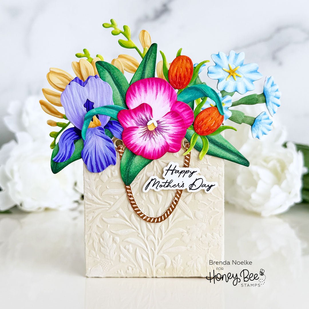 3D pop-up Mother's Day card featuring a textured white bag topped with colorful paper flowers.