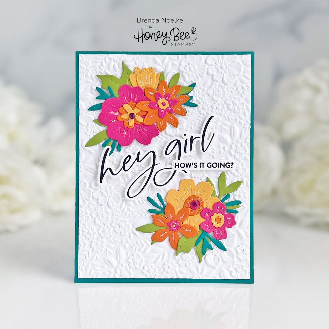 Handmade greeting card with floral embellishments and 'hey girl HOW'S IT GOING?' text.