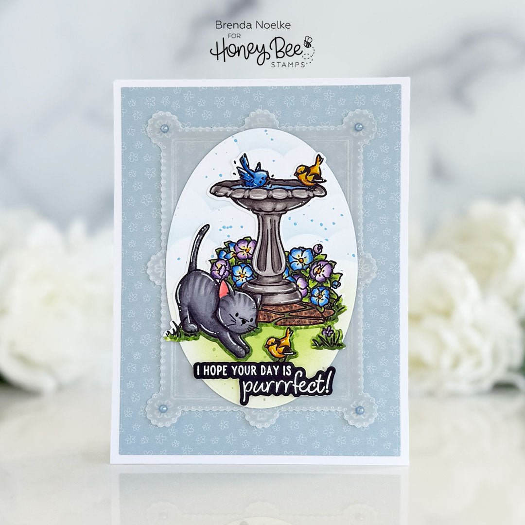 Handmade card with a grey cat, birds, and a birdbath, reading 'I hope your day is purrrfect!'