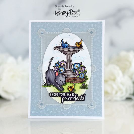 Handmade card with a grey cat, birds, and a birdbath, reading 'I hope your day is purrrfect!'