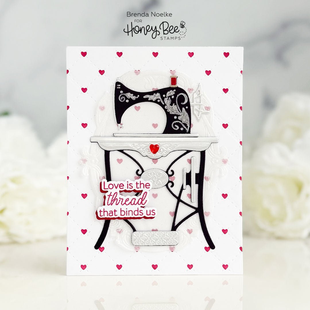 Handmade card with a black vintage sewing machine die cut and 'Love is the thread that binds us'