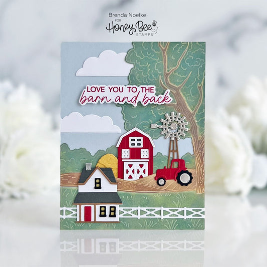 Handmade card featuring a red barn, tractor, and farmhouse with 'Love you to the barn and back' text.