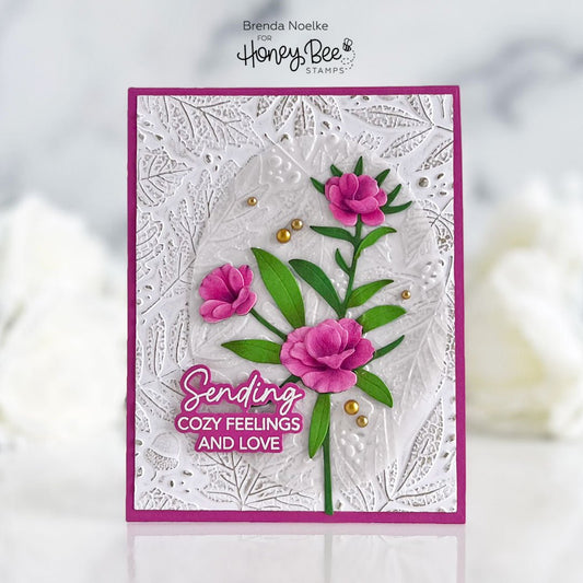 Handmade card with embossed white background, pink 3D flowers, and 'Sending Cozy Feelings and Love' text.