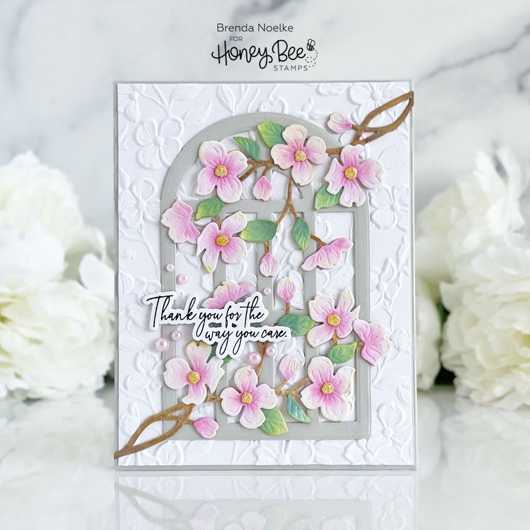 Handmade thank you card with 3D pink floral embellishments and an arched window design.