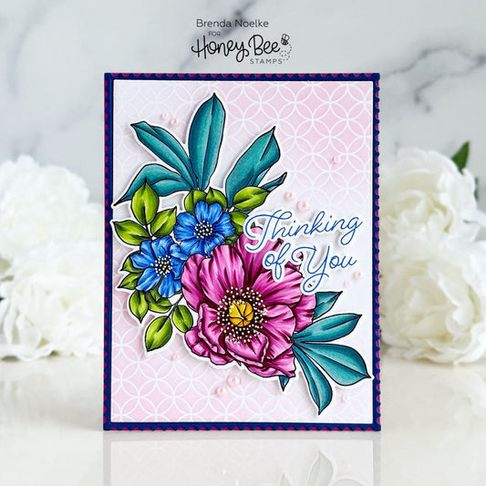 Handmade 'Thinking of You' card featuring colorful stamped peonies and blue flowers.