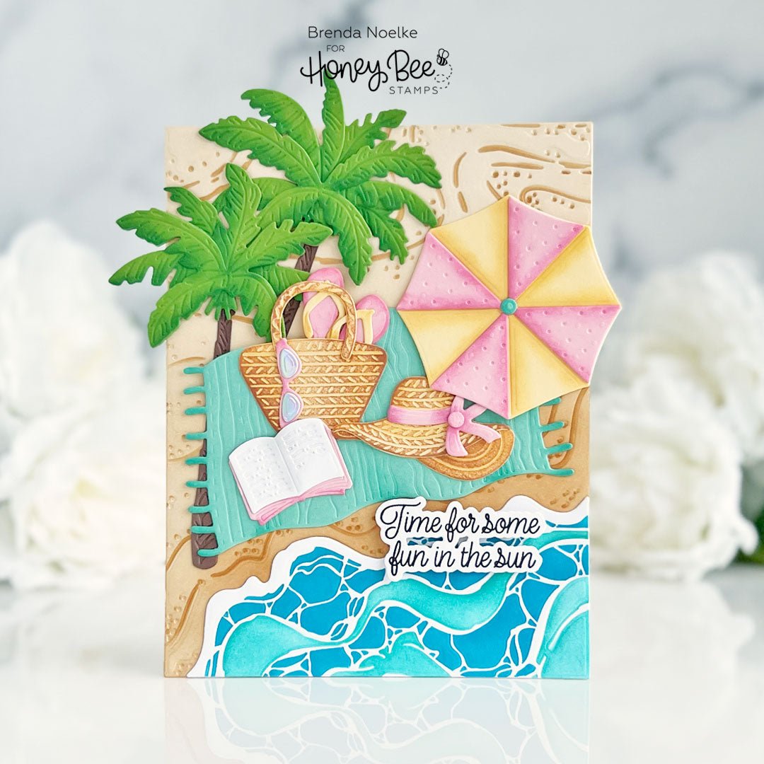 Handmade beach-themed card with 3D palm trees, beach umbrella, and accessories.