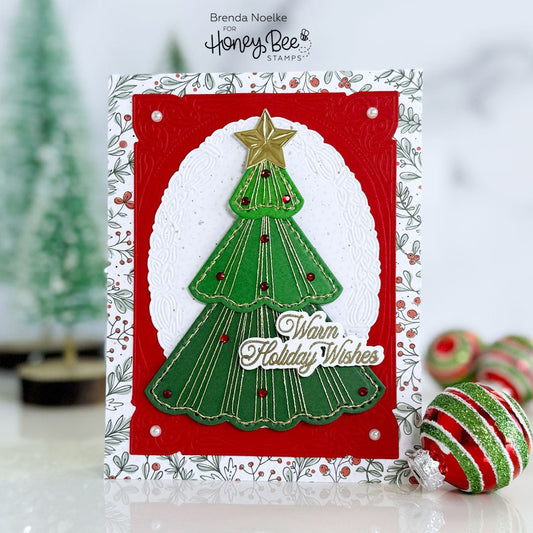 Handmade Christmas card with a stitched green tree, gold star, and Warm Holiday Wishes sentiment.