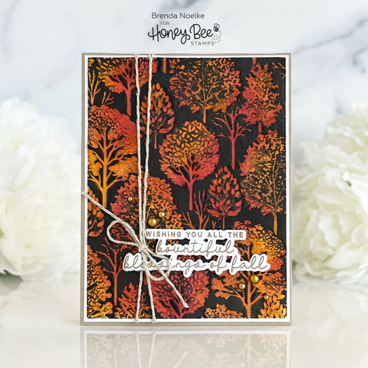 Autumn-themed handmade card with colorful stamped trees and 'Bountiful Blessings of Fall' text.