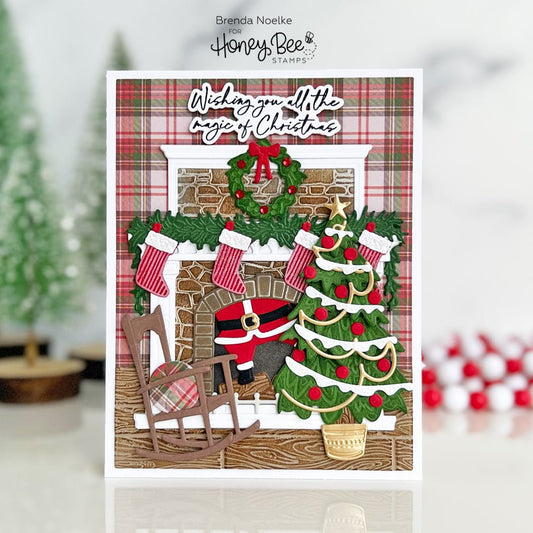 Handmade Christmas card featuring a cozy fireplace, decorated tree, and rocking chair.