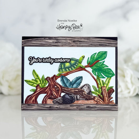 Handmade card featuring a cute turtle on a branch with the text 'You're turtley awesome'.