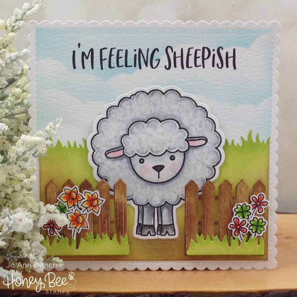 Card with a cartoon sheep and 'I'm Feeling Sheepish' text, featuring Honey Bee Stamps branding.