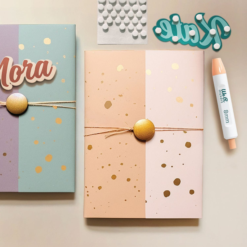 Three notebooks with decorative elements on a beige background