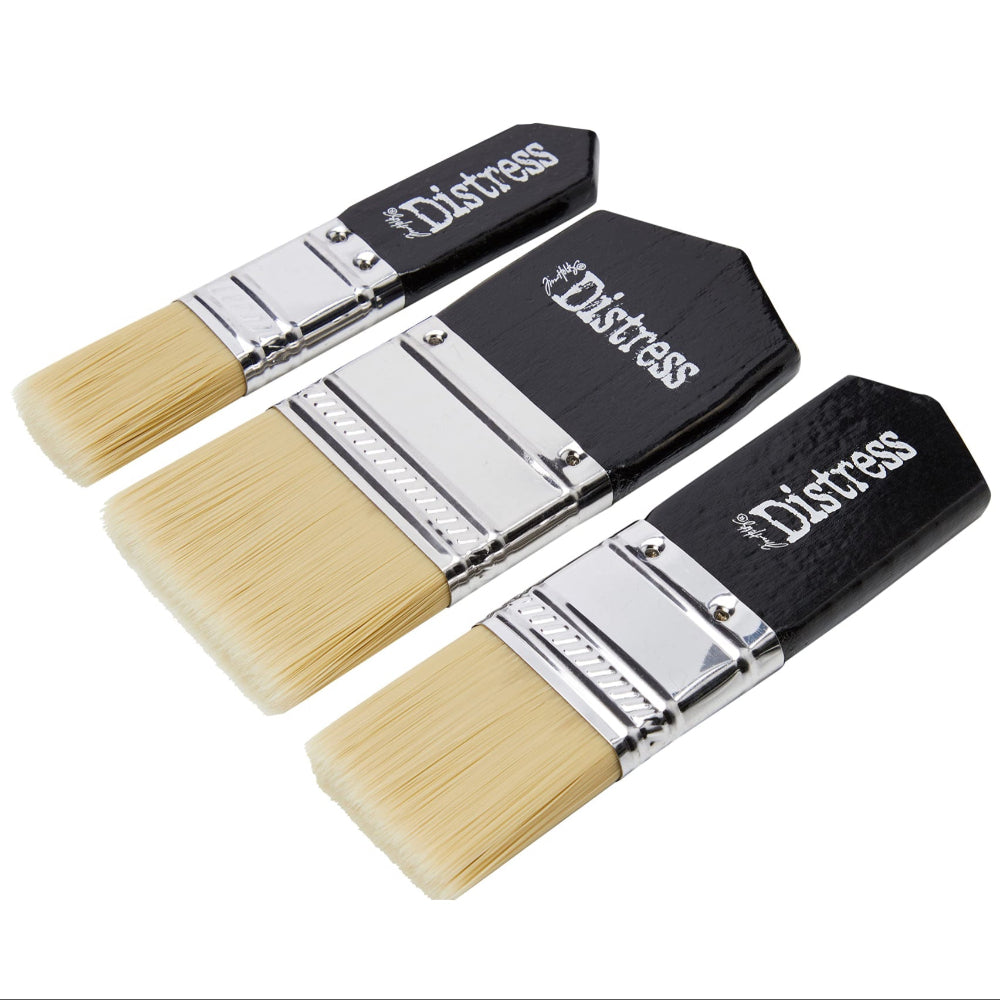 Three paintbrushes with 'Distress' branding on a white background