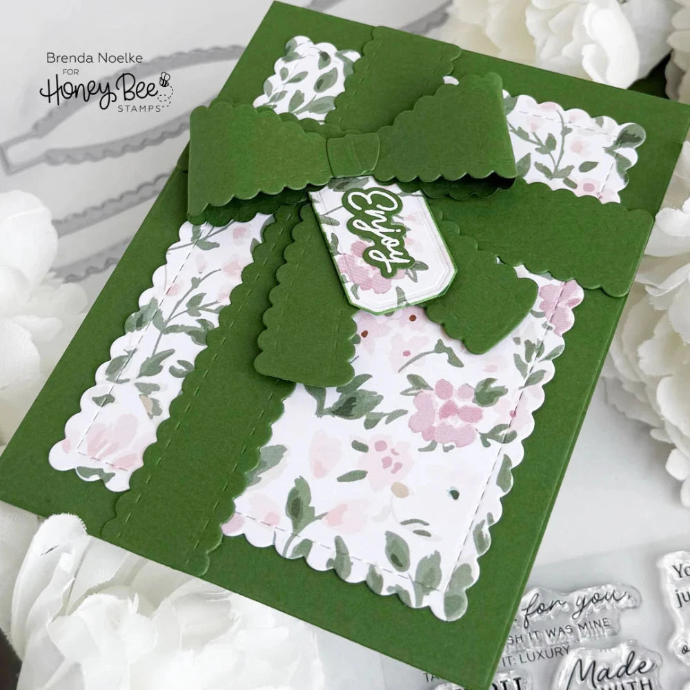 Green floral card with decorative elements on a white background