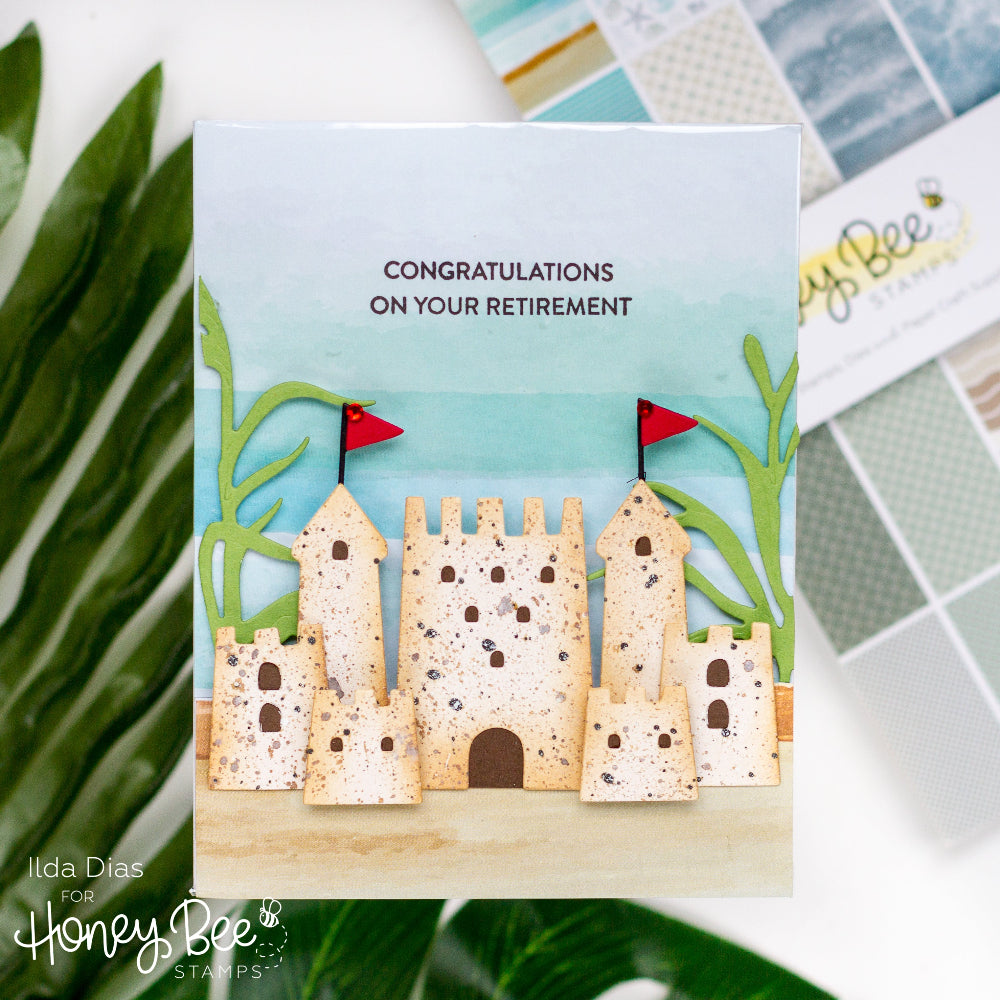 Retirement card with sandcastle design and 'Congratulations on your retirement' text