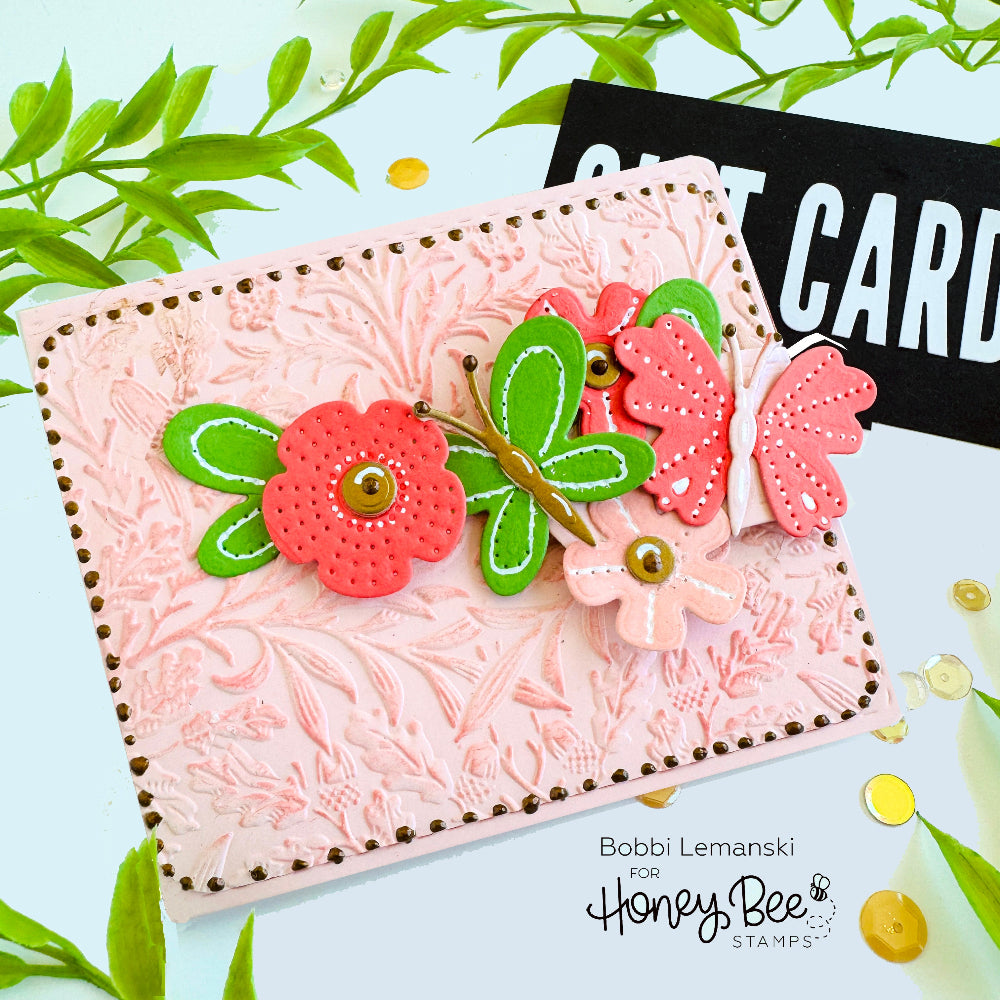 Decorative card with flowers and butterflies on a light blue background with green leaves.