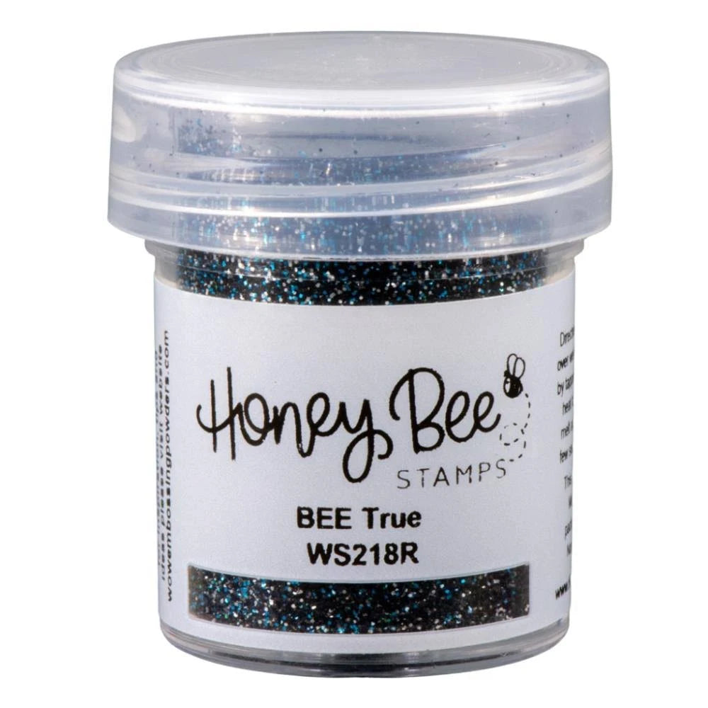 Jar of glitter with 'Honey Bee Stamps' label on a white background